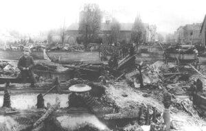 A boy sits among the debris in Titusville